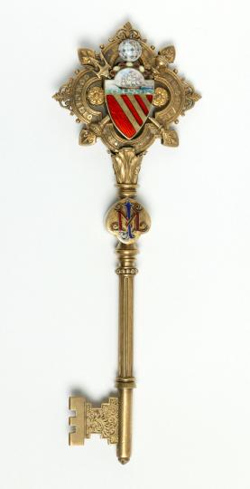 Ceremonial key bearing Manchester crest, made for Manchester Town Hall, 1877-1956