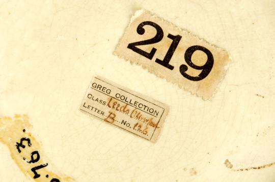Base of Liverpool Lighthouse mug, showing collector's labels