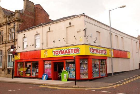 Shop in Westhoughton, Bolton, with carving of James Watkins
