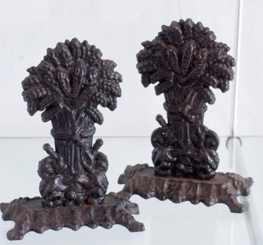 Pair of cast iron wheatsheaves